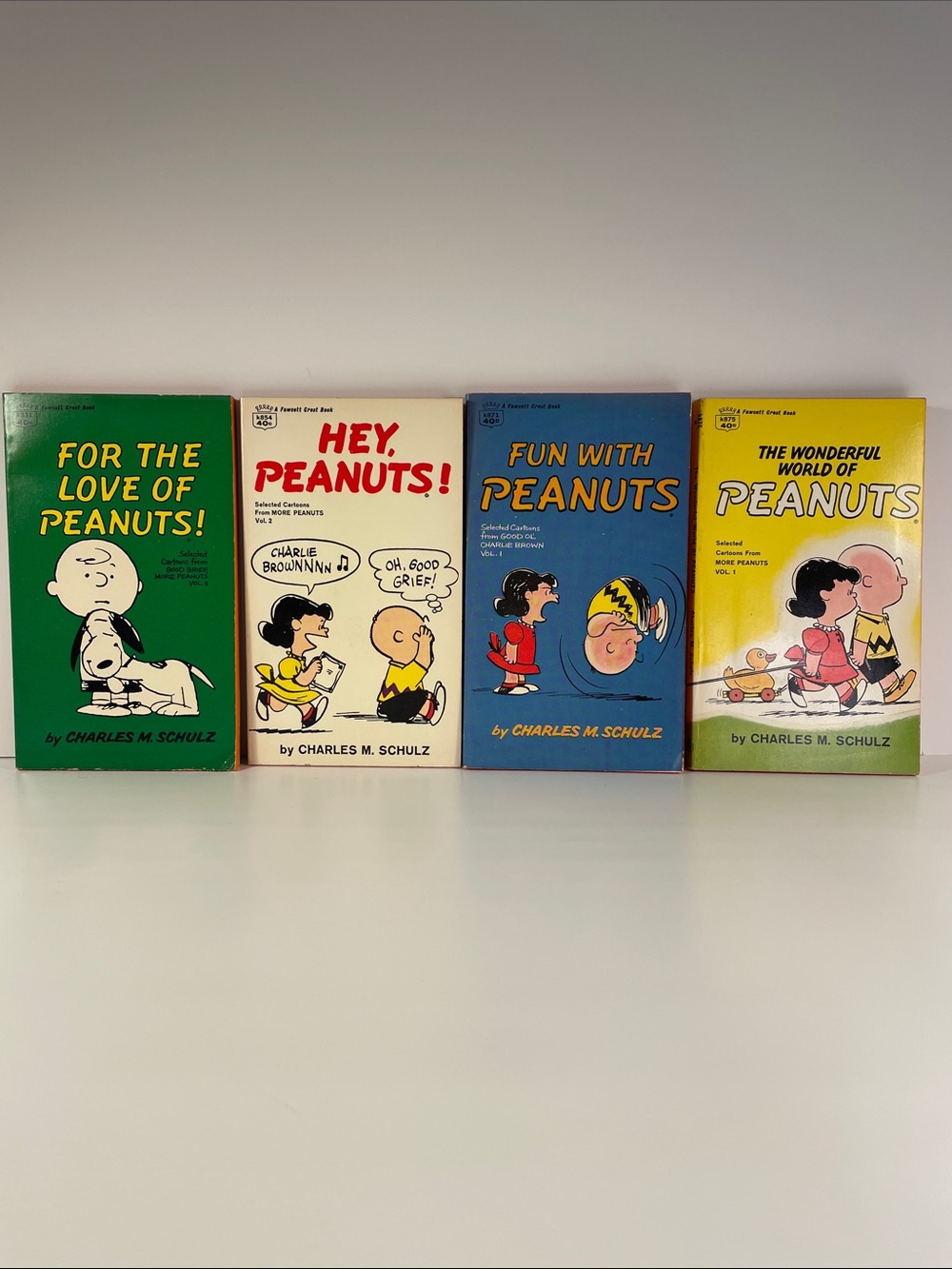 Peanuts Book Set 1960’s- Green, White, Blue, Yellow